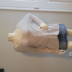 Cream knit sweater.